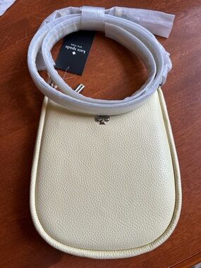 kate spade Pale Yellow Pebbled Leather Crossbody with Gold Spade Accent